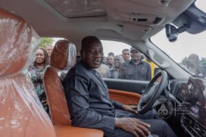 Minister in car